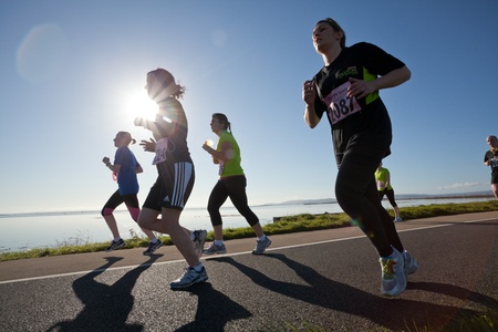 GALWAY, IRELAND - OCTOBER 6: Bernadine Casserly (2087) and other athletes compete during annual Galway Bay Half Marathon and 10K, on October 6, 2012 in Galway, Ireland.のeditorial素材