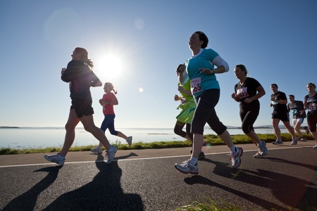GALWAY, IRELAND - OCTOBER 6: Unidentified athletes compete during annual Galway Bay Half Marathon and 10K, on October 6, 2012 in Galway, Ireland.のeditorial素材