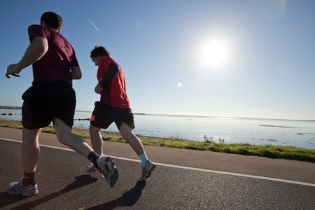 GALWAY, IRELAND - OCTOBER 6: Unidentified athletes compete during annual Galway Bay Half Marathon and 10K, on October 6, 2012 in Galway, Ireland.のeditorial素材