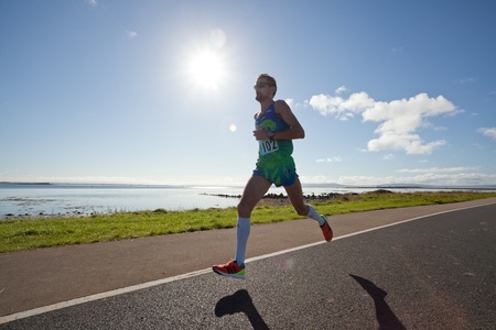 GALWAY, IRELAND - OCTOBER 6: Sergiu Ciobanu (1102),  Lead Man, compete during annual Galway Bay Half Marathon and 10K, on October 6, 2012 in Galway, Ireland.のeditorial素材