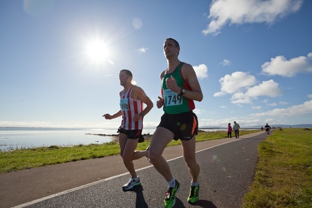 GALWAY, IRELAND - OCTOBER 6: Paddy OToole (1749) and other athletes compete during annual Galway Bay Half Marathon and 10K, on October 6, 2012 in Galway, Ireland.のeditorial素材