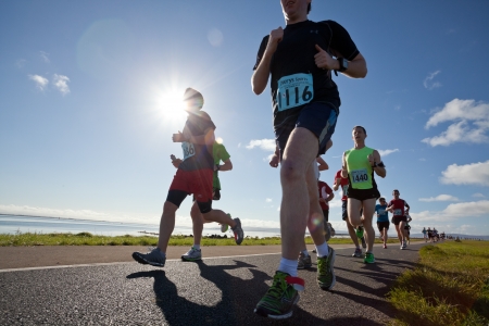 GALWAY, IRELAND - OCTOBER 6: Unidentified athletes compete during annual Galway Bay Half Marathon and 10K, on October 6, 2012 in Galway, Ireland.のeditorial素材