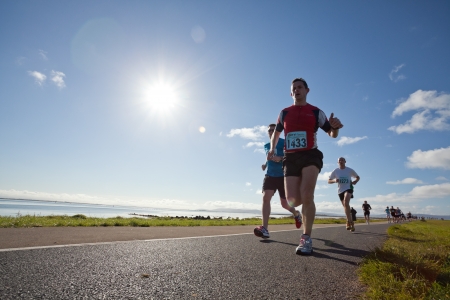 GALWAY, IRELAND - OCTOBER 6: Deyrick Deane and other athletes compete during annual Galway Bay Half Marathon and 10K, on October 6, 2012 in Galway, Ireland.のeditorial素材
