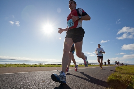 GALWAY, IRELAND - OCTOBER 6: Deyrick Deane and other athletes compete during annual Galway Bay Half Marathon and 10K, on October 6, 2012 in Galway, Ireland.のeditorial素材