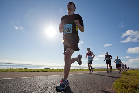 GALWAY, IRELAND - OCTOBER 6: Eamonn Doran and other  athletes compete during annual Galway Bay Half Marathon and 10K, on October 6, 2012 in Galway, Ireland.のeditorial素材