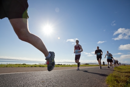 GALWAY, IRELAND - OCTOBER 6: Unidentified athletes compete during annual Galway Bay Half Marathon and 10K, on October 6, 2012 in Galway, Ireland.のeditorial素材