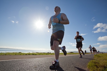 GALWAY, IRELAND - OCTOBER 6: Unidentified athletes compete during annual Galway Bay Half Marathon and 10K, on October 6, 2012 in Galway, Ireland.のeditorial素材