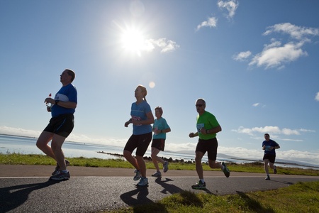 GALWAY, IRELAND - OCTOBER 6: Unidentified athletes compete during annual Galway Bay Half Marathon and 10K, on October 6, 2012 in Galway, Ireland.のeditorial素材