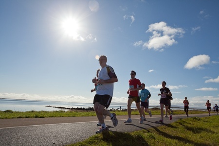 GALWAY, IRELAND - OCTOBER 6: Unidentified athletes compete during annual Galway Bay Half Marathon and 10K, on October 6, 2012 in Galway, Ireland.のeditorial素材