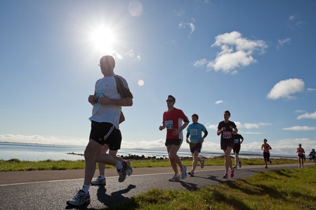 GALWAY, IRELAND - OCTOBER 6: Unidentified athletes compete during annual Galway Bay Half Marathon and 10K, on October 6, 2012 in Galway, Ireland.のeditorial素材