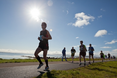 GALWAY, IRELAND - OCTOBER 6: Unidentified athletes compete during annual Galway Bay Half Marathon and 10K, on October 6, 2012 in Galway, Ireland.のeditorial素材