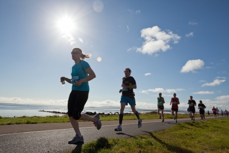 GALWAY, IRELAND - OCTOBER 6: Unidentified athletes compete during annual Galway Bay Half Marathon and 10K, on October 6, 2012 in Galway, Ireland.のeditorial素材