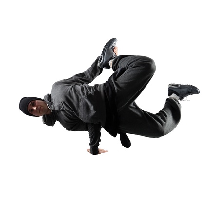 Young man breakdancing in the roomの写真素材