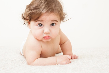Portrait of Cute baby boy, eight month old, close-upの写真素材
