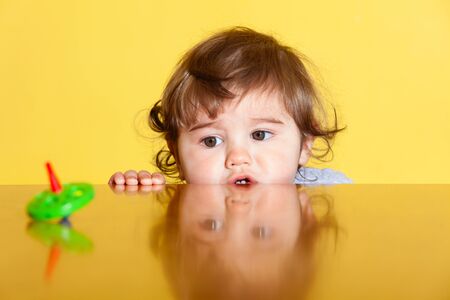 Portrait of Cute baby boy in the room, close-upの写真素材