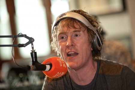 BALLINASLOE - JUNE 29  RTE 2fm presenter Hector O Heochagain talking during morning broadcast from Carlton Shearwater Hotel on June 29, 2012 in Ballinasloe, Ireland のeditorial素材