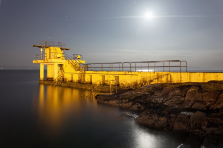 Moon over Blackrock diving board  Salthill, Galwayの写真素材