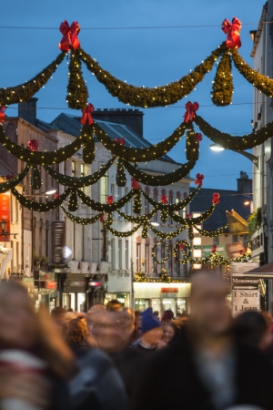 Shop street at night illuminated with Christmas lights, Galway, Irelandの写真素材