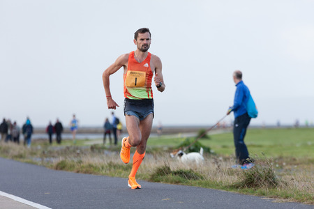 GALWAY, IRELAND - OCTOBER 4: Sergiu Ciobanu, winner, compete during annual Galway Bay Half Marathon and 10K, on October 4, 2014 in Galway, Ireland.のeditorial素材