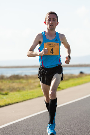 GALWAY, IRELAND - OCTOBER 4: David Mansfield, 3d place, compete during annual Galway Bay Half Marathon and 10K, on October 4, 2014 in Galway, Ireland.のeditorial素材
