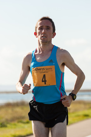 GALWAY, IRELAND - OCTOBER 4: David Mansfield, 3d place, compete during annual Galway Bay Half Marathon and 10K, on October 4, 2014 in Galway, Ireland.のeditorial素材