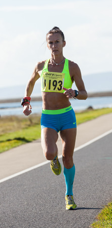 GALWAY, IRELAND - OCTOBER 4: Pauline Curley, 2nd place, compete during annual Galway Bay Half Marathon and 10K, on October 4, 2014 in Galway, Ireland.のeditorial素材