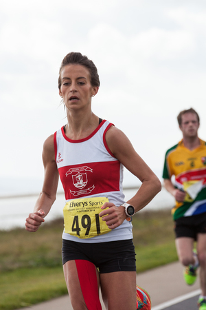 GALWAY, IRELAND - OCTOBER 4: Barbara Dunne compete during annual Galway Bay Half Marathon and 10K, on October 4, 2014 in Galway, Ireland.のeditorial素材