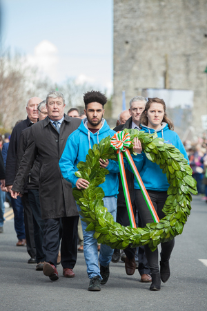 ATHENRY, IRELAND - MARCH 28: Undidentified people taking part in Parade during State ceremony marking the centenary of the 1916 Easter Rising on March 28, 2016 in Athenry, Ireland.のeditorial素材