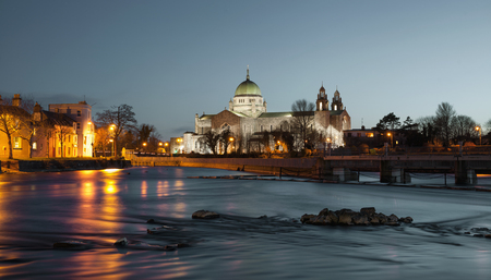 Galway Cathedral at night. Vieew from From The  corrib river.の写真素材
