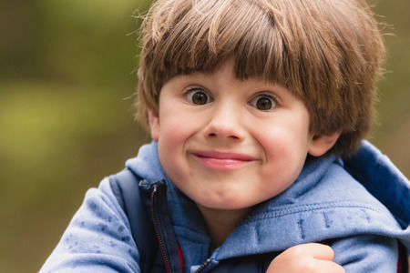 Outdoor portrait of cute young boy. Close up.の写真素材