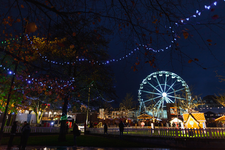 Christmas Market with big wheel, illuminated at night. Galway, Ireland,の写真素材