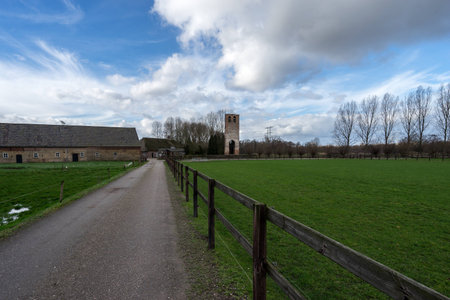 Farmland with tower and farmの写真素材
