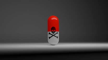 red pill with a skull and crossbonesの写真素材