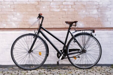 Old black bicycleの写真素材