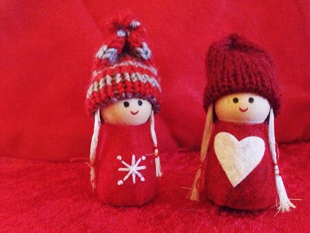 Two little Santa Girl as christmas decorationの素材