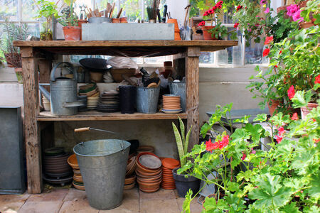 little greenhouse with tools for gardeningの写真素材