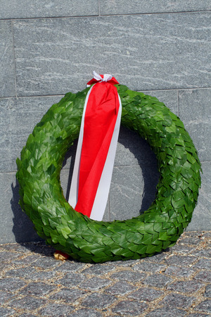 laurel wreath with a red and white bannerの写真素材