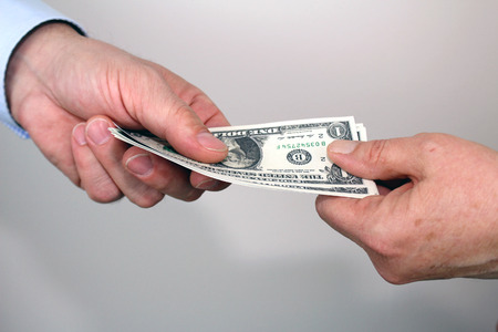 giving moneyの写真素材