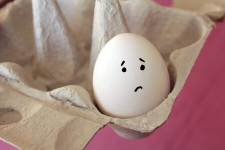 one single little sad eggの写真素材