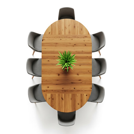 Top view of an oval modern conference table made of wood with potted plant.の素材