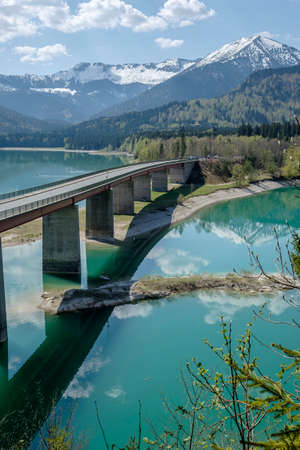 Bridge over the Sylvenstein lake in Upper Bavariaの写真素材