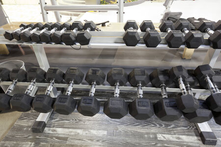 Dumbbell rack in gymの写真素材
