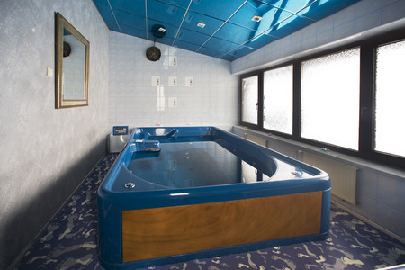 Big hydrotherapy tub in spa centerの写真素材