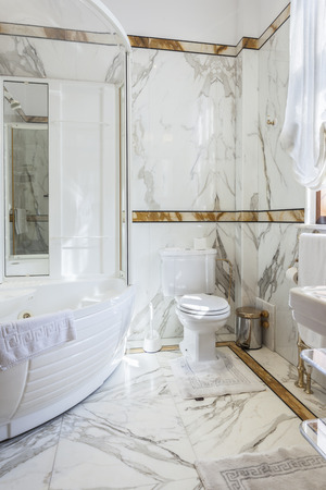Luxury bathroom with marble tilesの写真素材