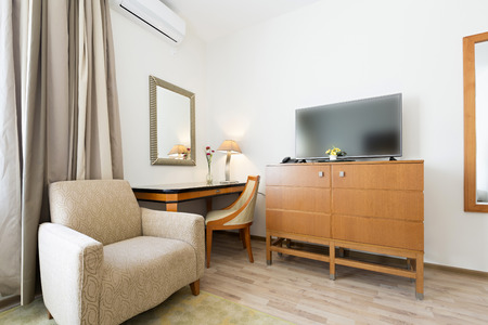 Interior of a classic styled apartment with wooden furnitureの写真素材