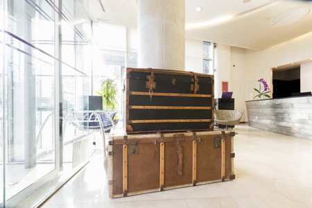 Vintage suitcases in hotel lobbyの写真素材