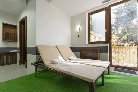 Sunbeds in hotel spa centerの写真素材