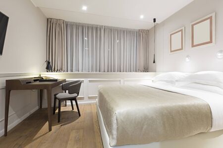 Modern bedroom interior in the eveningの写真素材