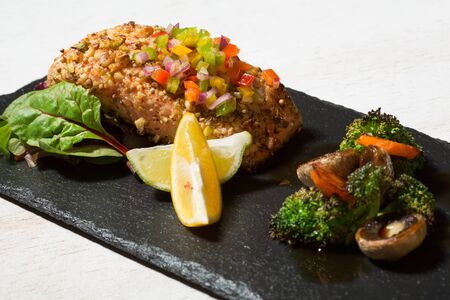 Grilled salmon with vegetablesの写真素材