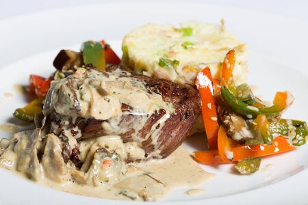 Grilled beef medium steak with Risottoの写真素材